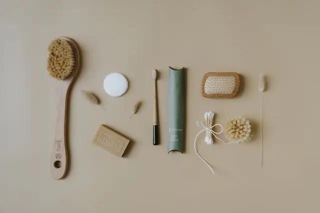 A flat lay image featuring various eco-friendly bath essentials and body care items, promoting zero waste lifestyle.